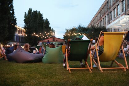 Modern open air cinema with comfortable seats in public park