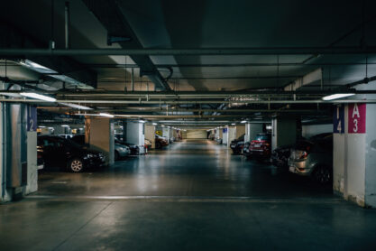 Inside underground car parking. Modern parking lots.
