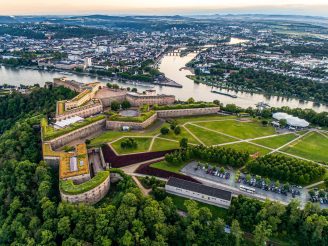 Aerial View of Ehrenbreitstein fortress and Koblenz City in Germany during sunset.