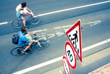 Road signs against young people riding bikes