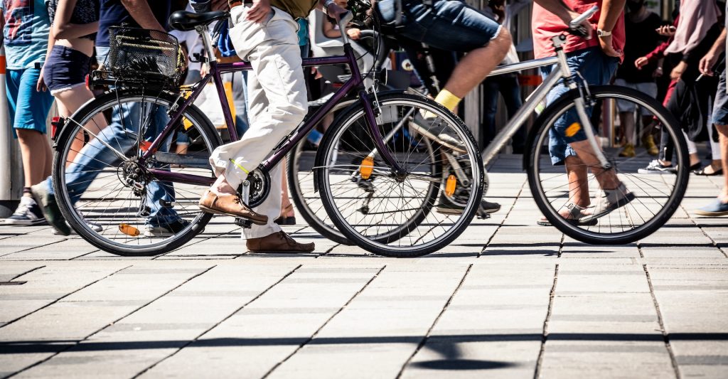 People on pedestrian crossings, on foot and by bicycle