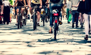 People on pedestrian crossings, on foot and by bicycle