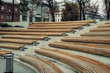 Wooden benches in the city in the form of an amphitheater. Resting-place