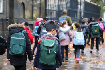 City of westminster, London, November 29, 2018: Happy school kids (students pupils) on their way to visit British museum